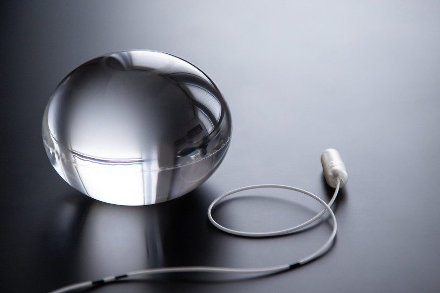 Allurion gastric balloon on reflective grey background